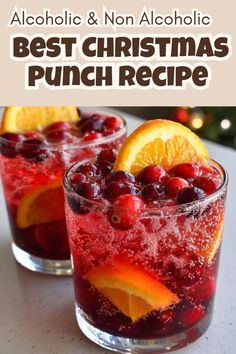 two glasses filled with cranberry and orange punch on top of a white table