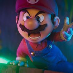 a cartoon character with a mustache and moustache pointing to the side while wearing overalls