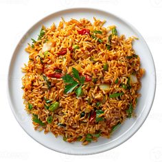 a white plate topped with rice and vegetables