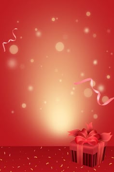 a red background with a gift box and streamers