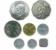 five different types of foreign coins, including one dollar and the other half - dollars