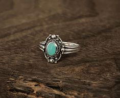 Vintage Style Turquoise Ring // Sizes 5 to 10 available  Metal: 925 Sterling Silver  Face Height : 14 mm Weight: 3-4 grams Stone: reconstructed turquoise  Finish: Oxidized Hallmark 925 Vintage Turquoise Ring Silver, Cheap Vintage Silver Turquoise Ring, Turquoise Engagement Rings, Antique Silver Turquoise Ring, Antique Style Silver Turquoise Ring, Western Style Turquoise Sterling Silver Ring, Antique Silver Ring With Turquoise Gemstone, Western Silver Turquoise Ring Stamped 925, Bohemian Silver Turquoise Ring Stamped 925