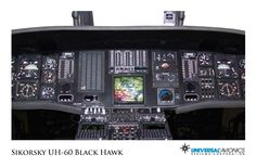 the cockpit of an airplane with many controls