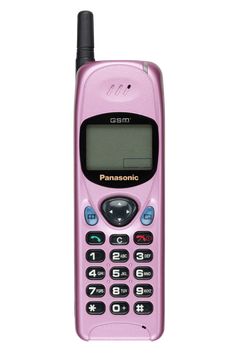 a pink cell phone sitting on top of a white surface