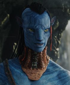 an avatar with blue skin and yellow eyes