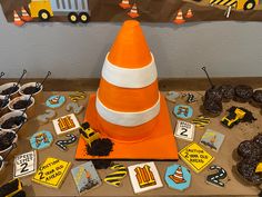a construction themed birthday party with cupcakes and cookies