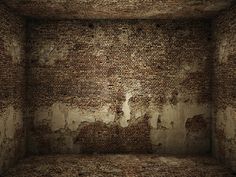 an empty room with brick walls and peeling paint on the walls is shown in this image