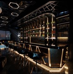a dimly lit bar with stools and bottles on the shelves in front of it