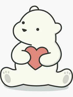a polar bear holding a heart in its paws