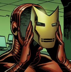 an iron man holding his head in front of his face