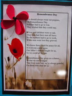 a remembrance card with two red flowers on it and a poem written in the middle