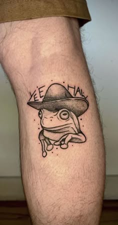 a man's leg with a tattoo that says kee nai on it