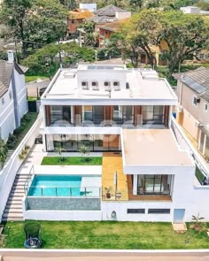 an aerial view of a house with a swimming pool