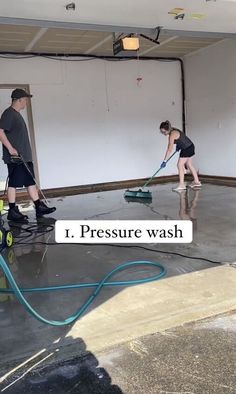 two men are cleaning the floor in an empty room with words above them that read, i pressure wash