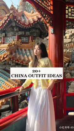 a woman standing in front of a building with the words china outfit ideas on it