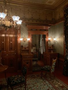 an ornately decorated room with antique furniture