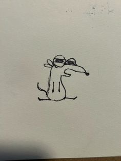 a drawing of a dog with sunglasses on it's head and legs, sitting in front of a piece of paper