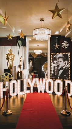 the hollywood sign is lit up with red carpet