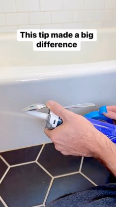 a man is using a wrench to fix a bathtub with the words, this tip made a big difference