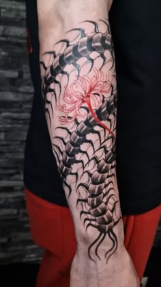 a person with a tattoo on their arm