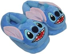 a pair of blue slippers with an elephant's mouth