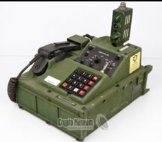 Retro Military Communication Gear, Retro Military Tech Setup, Military Communication Equipment Display, Vintage Military Communication Equipment Display, Vintage Military Communication Equipment, Retro Military Electronics, Green Military Control Box, Old Military Communication Devices, Vintage Military Machinery