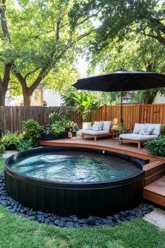 an outdoor hot tub in the middle of a yard