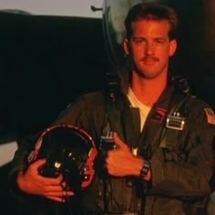 a man in an air force pilot's uniform