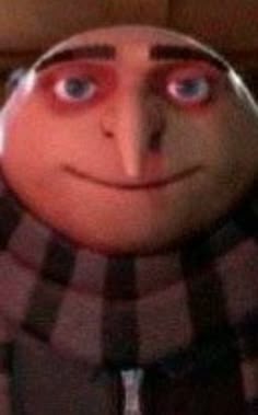 a close up of a person wearing a scarf and looking at the camera with an evil look on their face