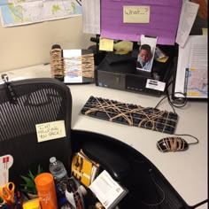 an office cubicle is cluttered with personal items