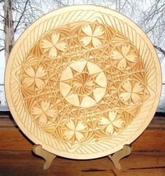 a wooden plate sitting on top of a window sill