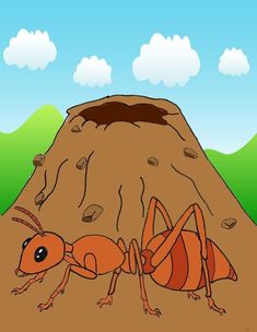 an antelope crawling on the ground in front of a hill with rocks and grass