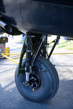 an airplane wheel is attached to the side of it