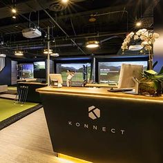 the interior of a golf themed office