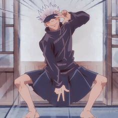 a man in a purple robe is sitting on the floor with his hands behind his head