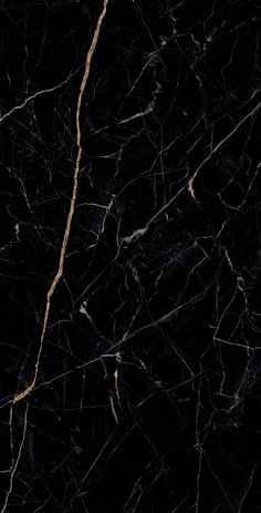 black marble with gold veining on the edges and dark background for wallpaper or backdrop
