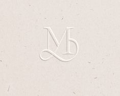 the letter m is made up of white paper