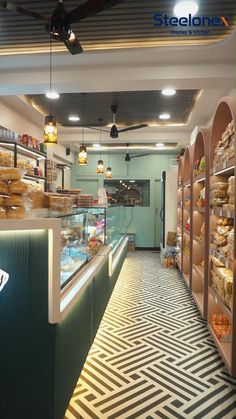 the inside of a deli filled with lots of different types of foods and pastries