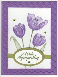 a card with purple flowers on it and the words sympathy written in white lettering,