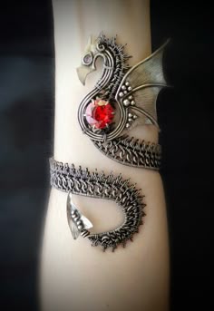 Unique Dragon Jewelry Ideas, Fantasy Style Dragon Accessory, Dragon Armlet, Dragon Arm Cuff, Fantasy Armband, Handmade Dragon-themed Jewelry, Red And Black Dragon Jewelry, Fantasy Silver Jewelry With Dragon Design, Red And Gold Dragon Jewelry