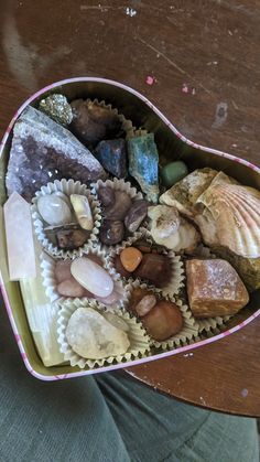 Super stuffed box of chocolate crystal. $75 @lemon.n.raspnerry on ig crystal box, crystals, heart box, chocolate box, crystal, amethyst, quartz, selenite, shell, red adventurine, aventurine, rough rock, rose quartz, clear quartz, crystal gift, diy crystal box, crysocolla, pyrite,pyrate, peacock ore, manifestation, abundance, self love, self care, treat yourself, green aventurine, geode Crystal Boxes, Box Of Heart-shaped Rocks, Box Of Crystals, Heart-shaped Tin With Stones, Hippie Witch Aesthetic, Valentine's Day Crystal Box, Chocolate Box With Crystals, Valentines Crystal Gift Box, Crystal Heart Box