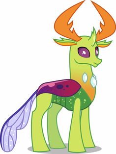 a green pony with horns on it's head and an orange horn around its neck