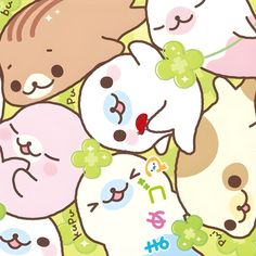 a group of cartoon cats laying next to each other on top of a green field