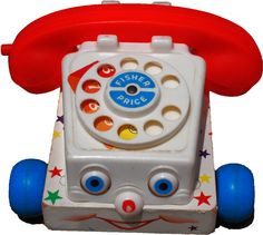 an old fashioned toy phone with blue wheels and stars on the front, attached to a red plastic case