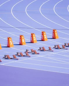 the starting blocks are lined up on the running track
