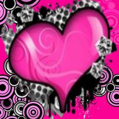 a pink heart with black and white swirls
