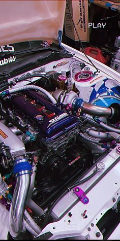 the engine compartment of a car is shown