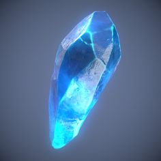 a large blue diamond is shown against a gray background with the light reflecting off it's side