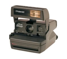 the polaroid one step camera is on display