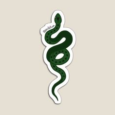 a sticker with a green snake on it